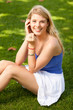 © Fotoluminate LLC - Pretty young blond woman in a park setting