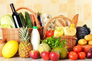 Groceries in wicker basket on kitchen table