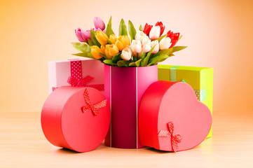 Wall Mural - giftbox and tulips against gradient background