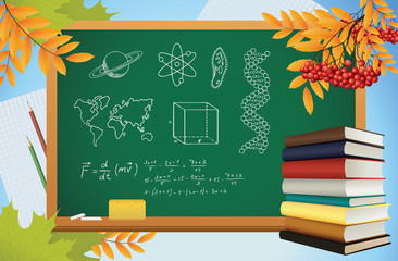 school autumn background with symbols on blackboard, books and y