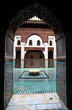 Arch doorway frames courtyard of madrasa