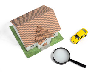 Wall Mural - Toy car and house with magnifier