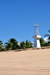 Wall Mural - faro bianco sulla spiaggia di gunga