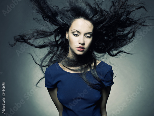 Fototapeta na wymiar Beautiful lady with magnificent dark hair