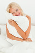 © WavebreakmediaMicro - Woman holding a pillow