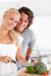 © WavebreakmediaMicro - Portrait of a beautiful couple cooking