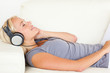 © WavebreakmediaMicro - Beautiful woman listening to music