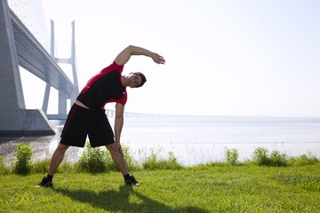 Wall Mural - Athlete warming and stretching