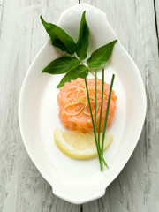 Wall Mural - salmon tartare with lemon and chive