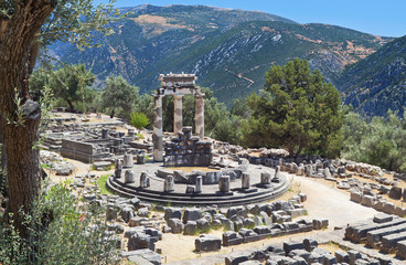 Wall Mural - Temple of Athena pronoia at Delphi site in Greece