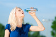© mr.markin - Woman drinking water at outdoors sport