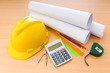 © Elnur - Drawings and hard hat on the desk