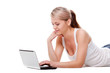 © chesterF - woman laying on the floor with laptop