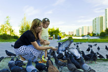 Mother Little Girl Feeding Pigeons Urban Blue-gray