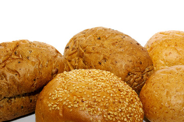 loafs of whole wheat and rye bread and isolated