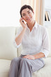 © WavebreakmediaMicro - Close up of a joyful woman with a cellphone