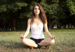 © Sunny - Young woman doing meditation outdoors