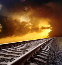 Railway To Horizon Under Dramatic Sky