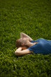 © Nikita Vishneveckiy - girl lying on the grass and sleeping peacefully