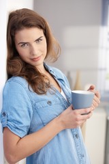 Poster - Attractive female drinking tea at home