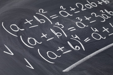 mathematical equations on blackboard