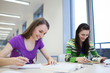 © lightpoet - in the library - two female students