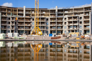 Construction site with water reflections
