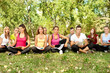 © luckybusiness - young people learning in park