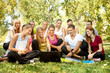 © luckybusiness - students with laptop in park
