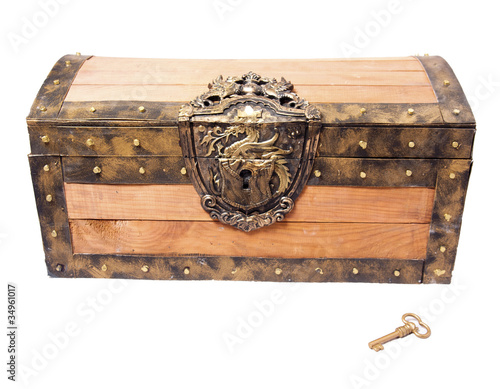 treasure chest with key isolated on white
