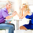 © Milles Studio - Closeup portrait of young cute couple at mall cafe.