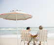 © JGI/Jamie Grill/Blend Images - Black couple enjoying beach together