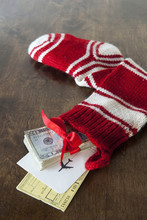 Christmas Stocking With Airline Tickets And Cash
