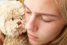 Close Up Teenage Girl With Cuddly Toy