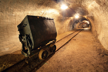 Wall Mural - Underground train in gold, silver and copper mine.
