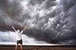 The  man and enormous thundercloud