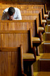 A man praying in church