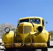 An yellow abandoned Bonnie and Clyde vehicle