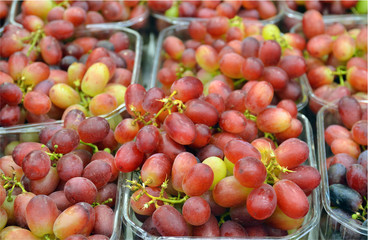 Wall Mural - Close up of grapes on market stand