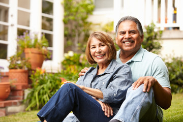 senior couple relaxing in garden