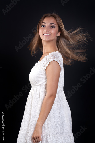 Fotografie, Obraz beautiful girl with her hair disheveled in the studio