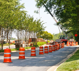 Wall Mural - Orange and White Barrels in Road Construction