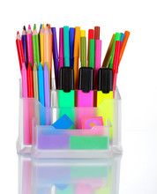 Bright Pens, Pencils And Markers In Holder Isolated On White