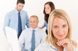 © CandyBox Images - Business team pretty businesswoman with colleagues