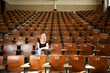 © Tyler Olson - Happy College Student in Lecture Hall