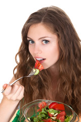 Wall Mural - Portrait of young smile beautiful woman eating vegetable salad