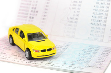 Wall Mural - Toy car and bankbook