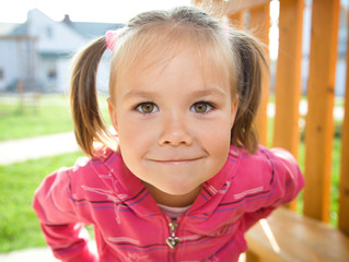 Cute little girl on playground