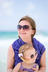 Sticker - Happy mother and daughter at beach