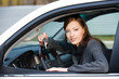 © Valua Vitaly - Successful woman with keys from  car